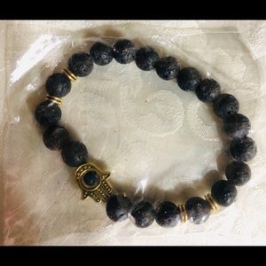 Black Lava Volcanic Gold Hamsa Charms Bracelet – Spiritual & Stylish